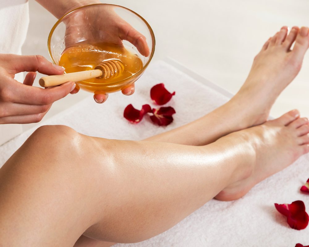 Warm wax being prepared for a waxing treatment